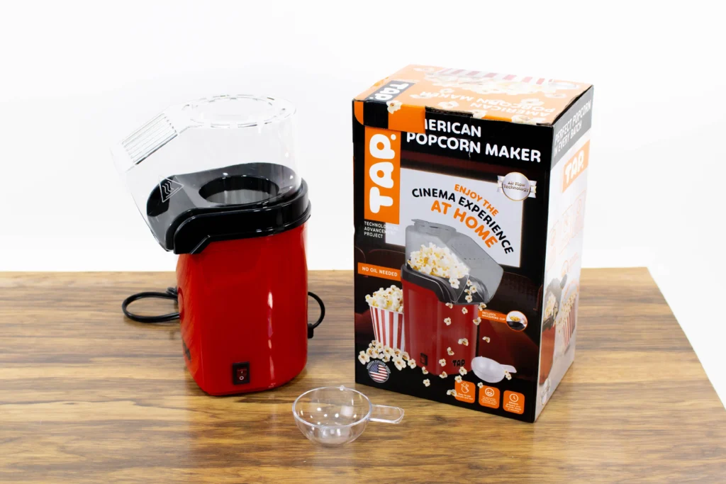 TAP Popcorn maker next to its packaging box