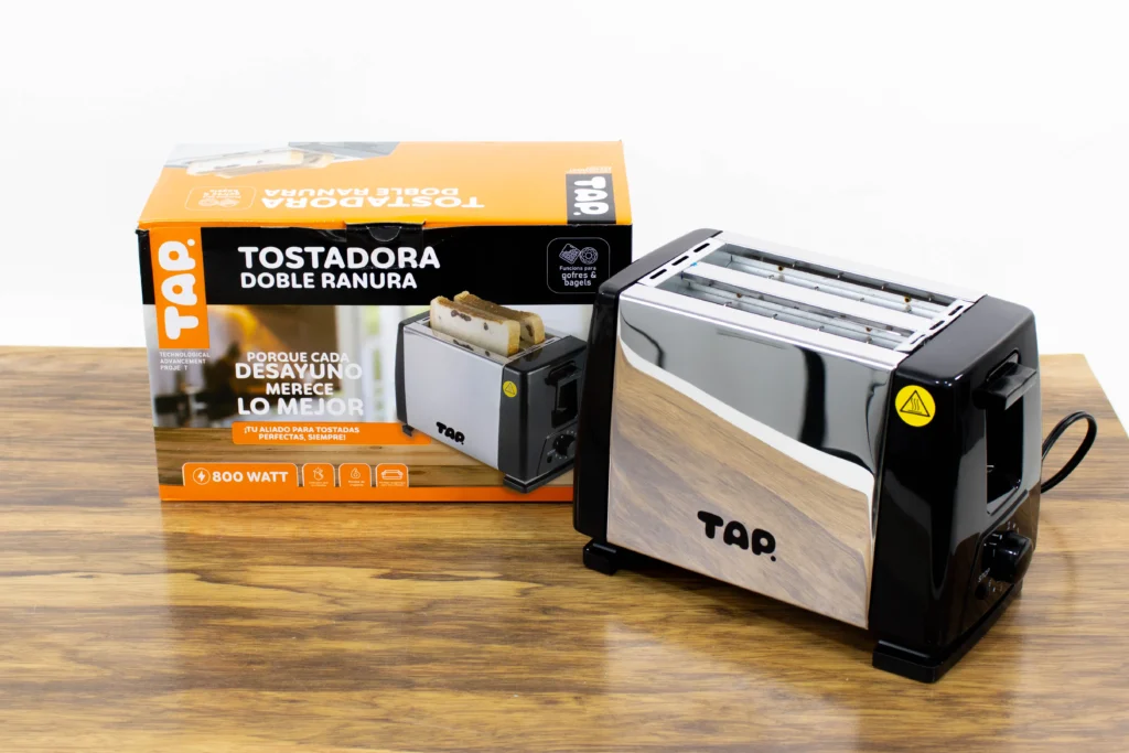 TAP toaster next to its packaging box