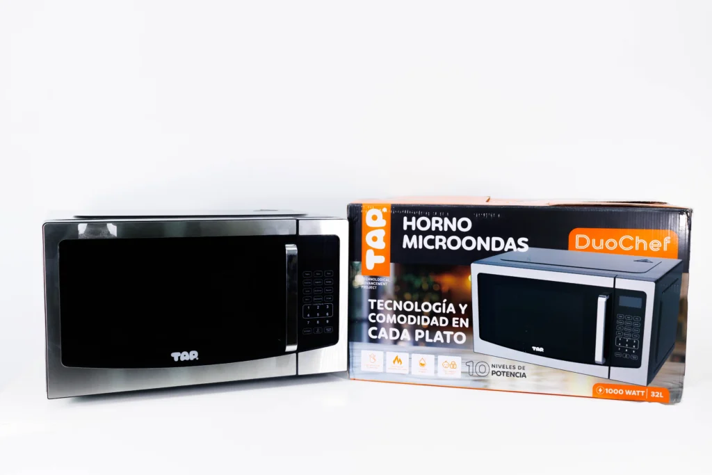 TAP microwave next to its packaging box.